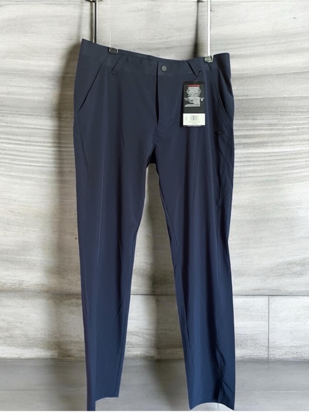 Oakley navy blue golf pants size 34x32